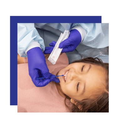 Fluoride varnish applied to child's teeth