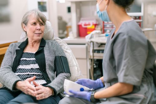 Elderly woman at dental appointment