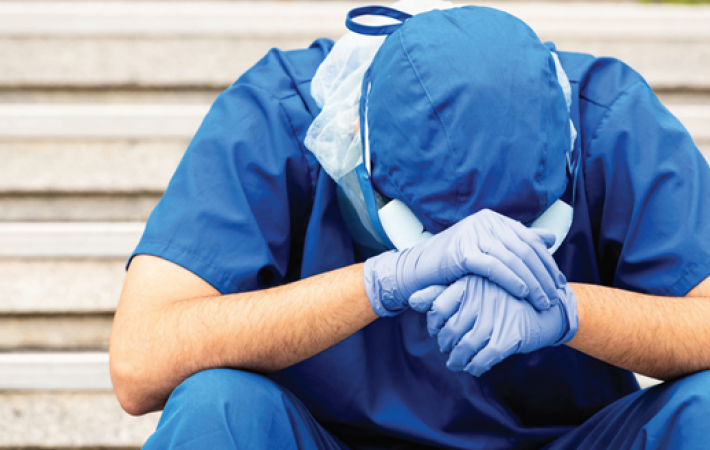 Burnout among Dental Professionals Before and During a Public Health Crisis: Causes, Consequences, and Next Steps