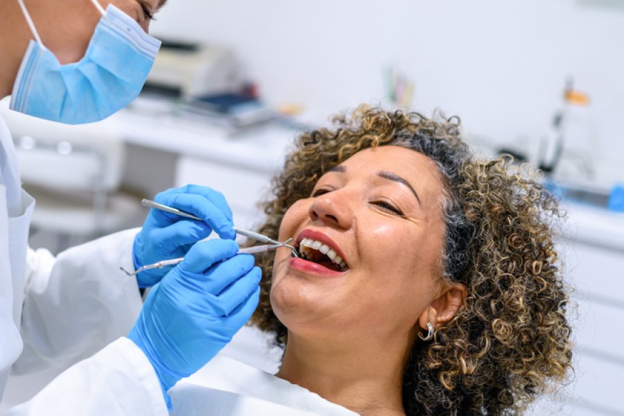 Image of woman getting a dental exam