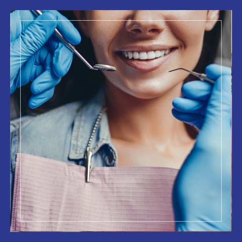 Woman with dental instruments 